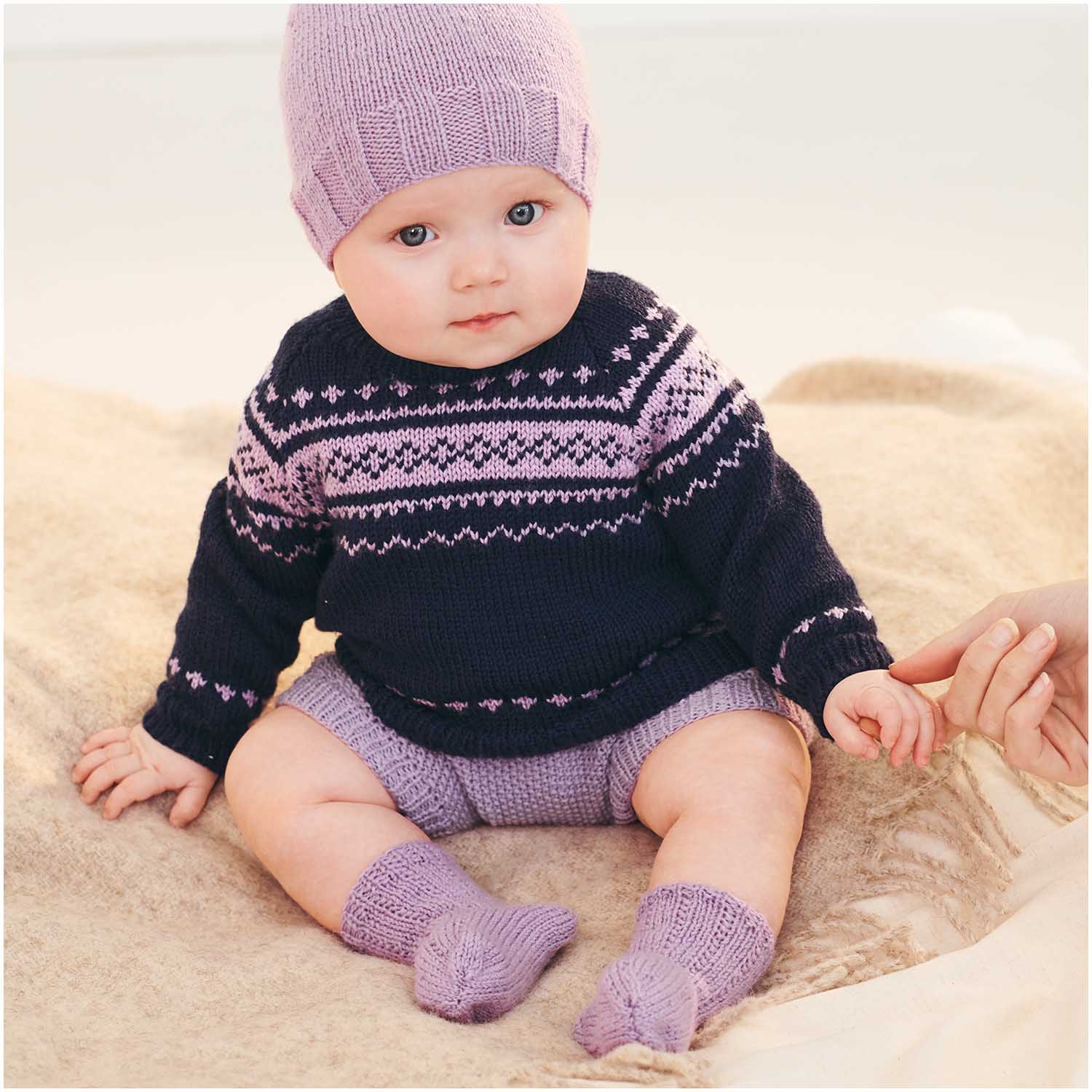 Breipakket Noors baby truitje