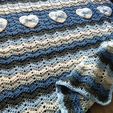 Haakpakket babydekentje hartjes blauw